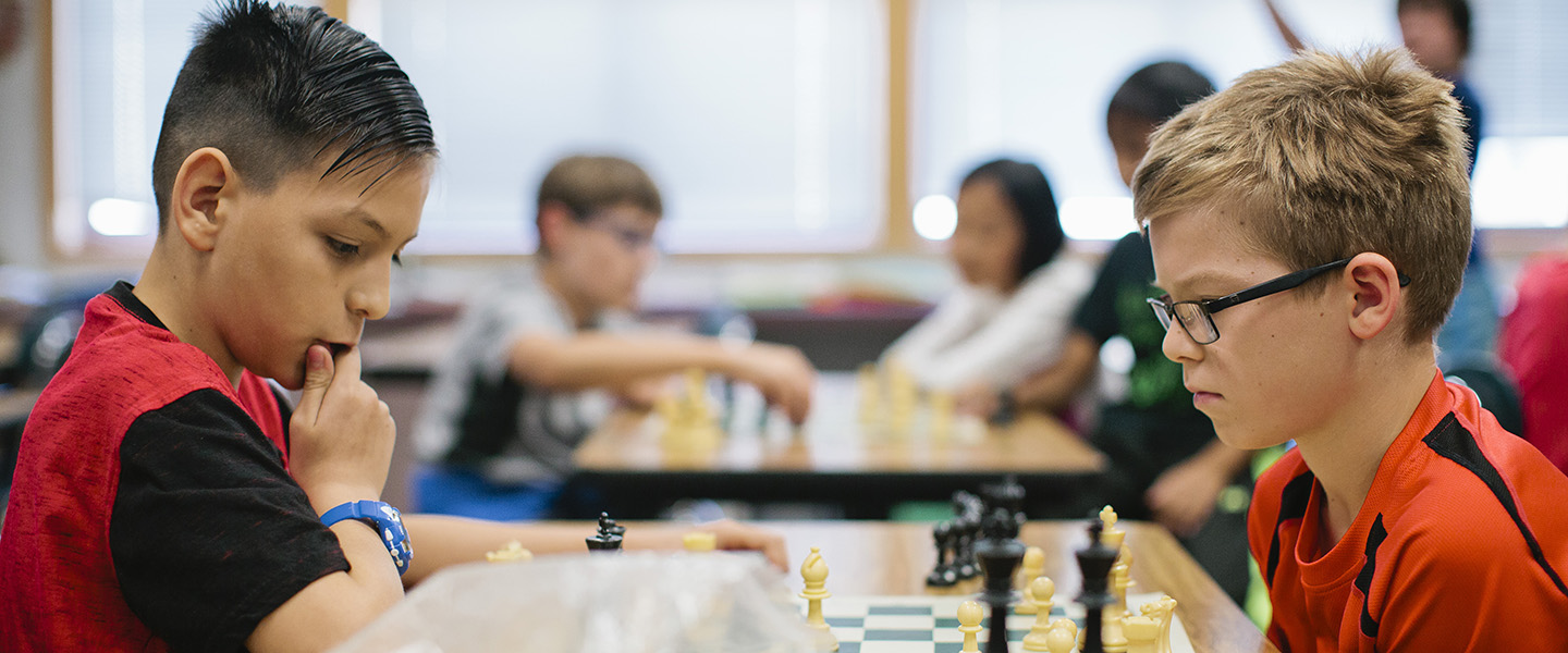 Two students playing chess